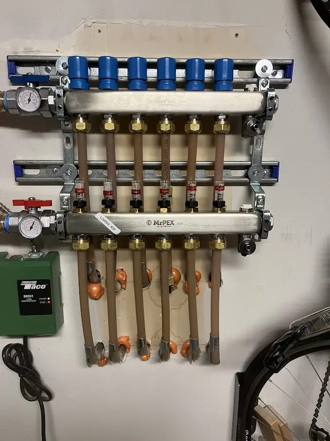 Plumber performing Leak Detection at a residential property in Waukee